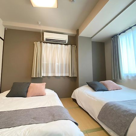 Suyi Apartment Осака Екстериор снимка