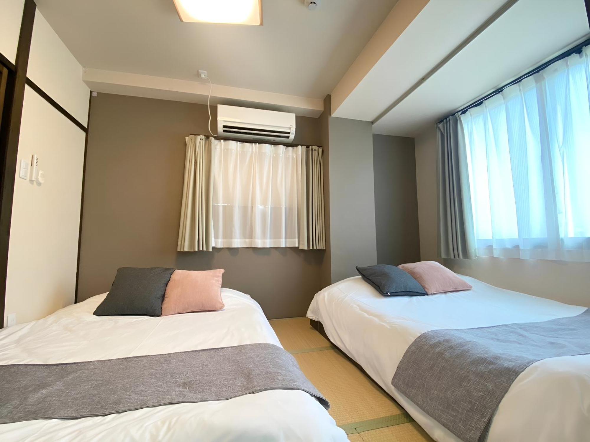 Suyi Apartment Осака Екстериор снимка