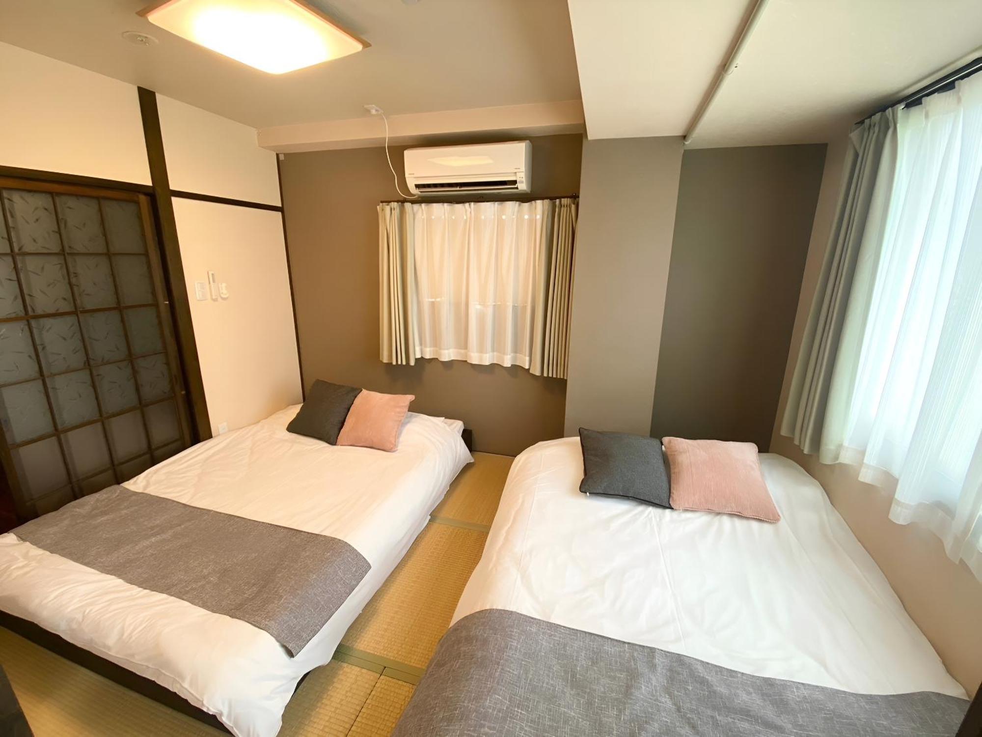 Suyi Apartment Осака Екстериор снимка