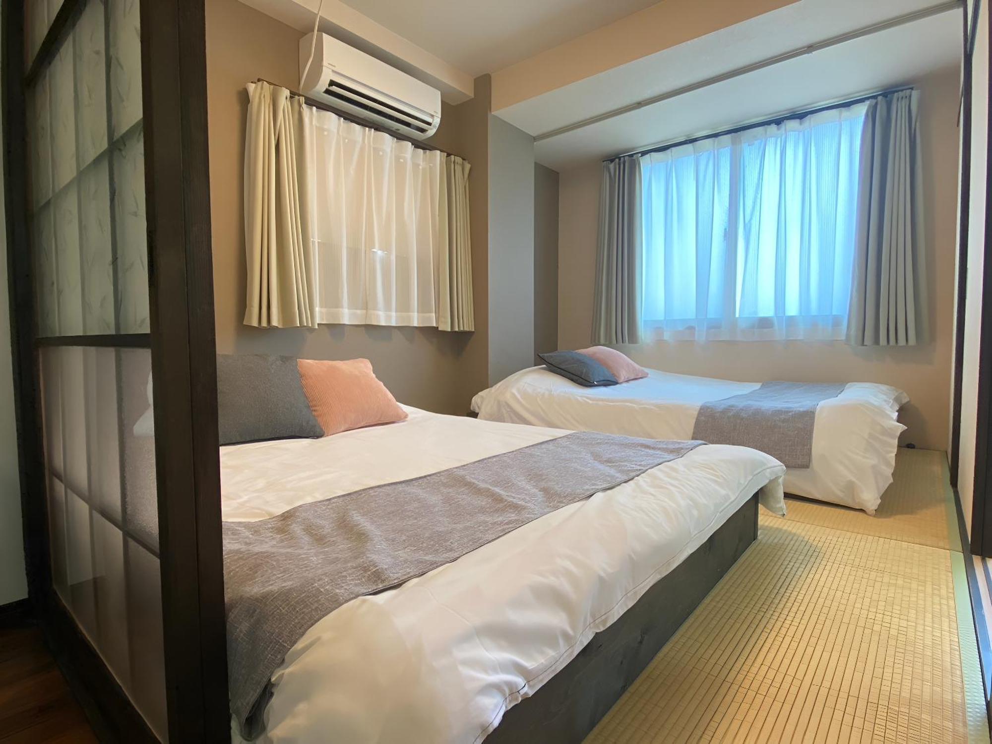 Suyi Apartment Осака Екстериор снимка