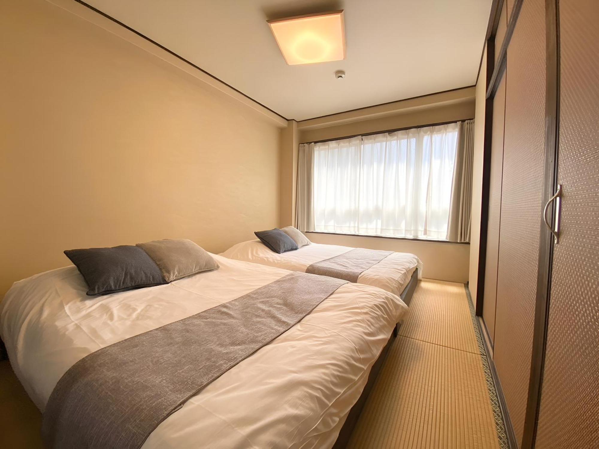 Suyi Apartment Осака Екстериор снимка