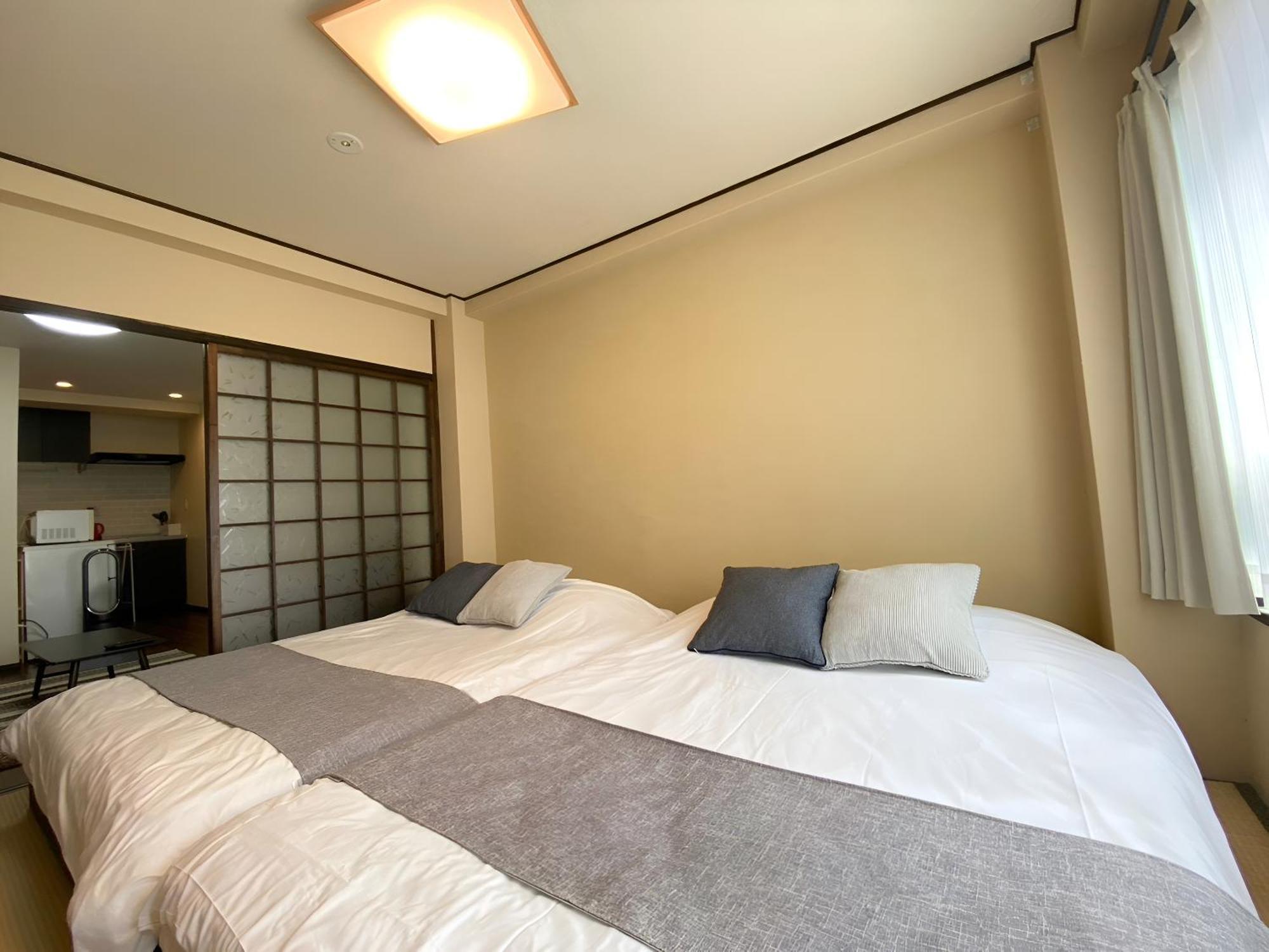 Suyi Apartment Осака Екстериор снимка