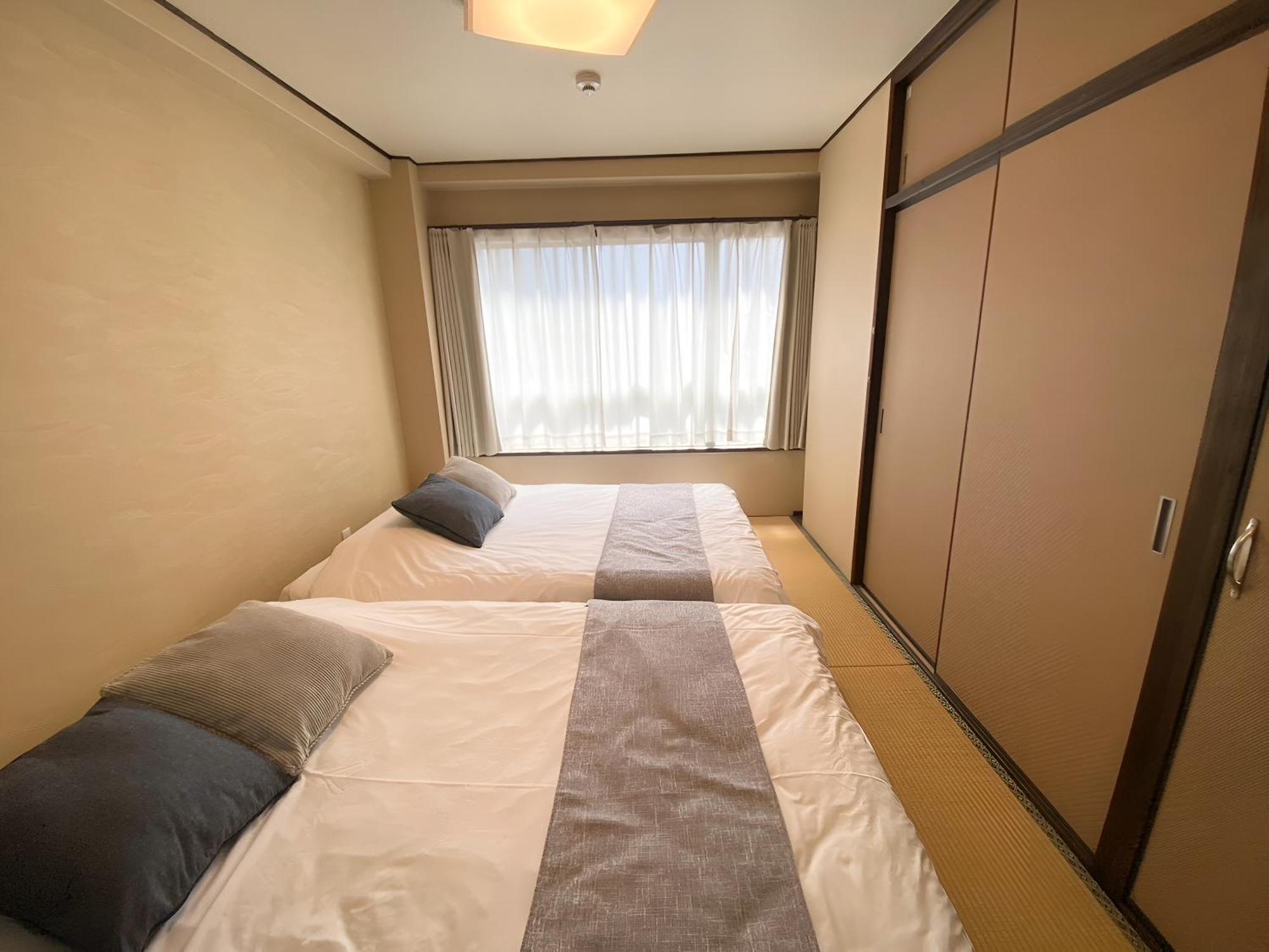 Suyi Apartment Осака Екстериор снимка