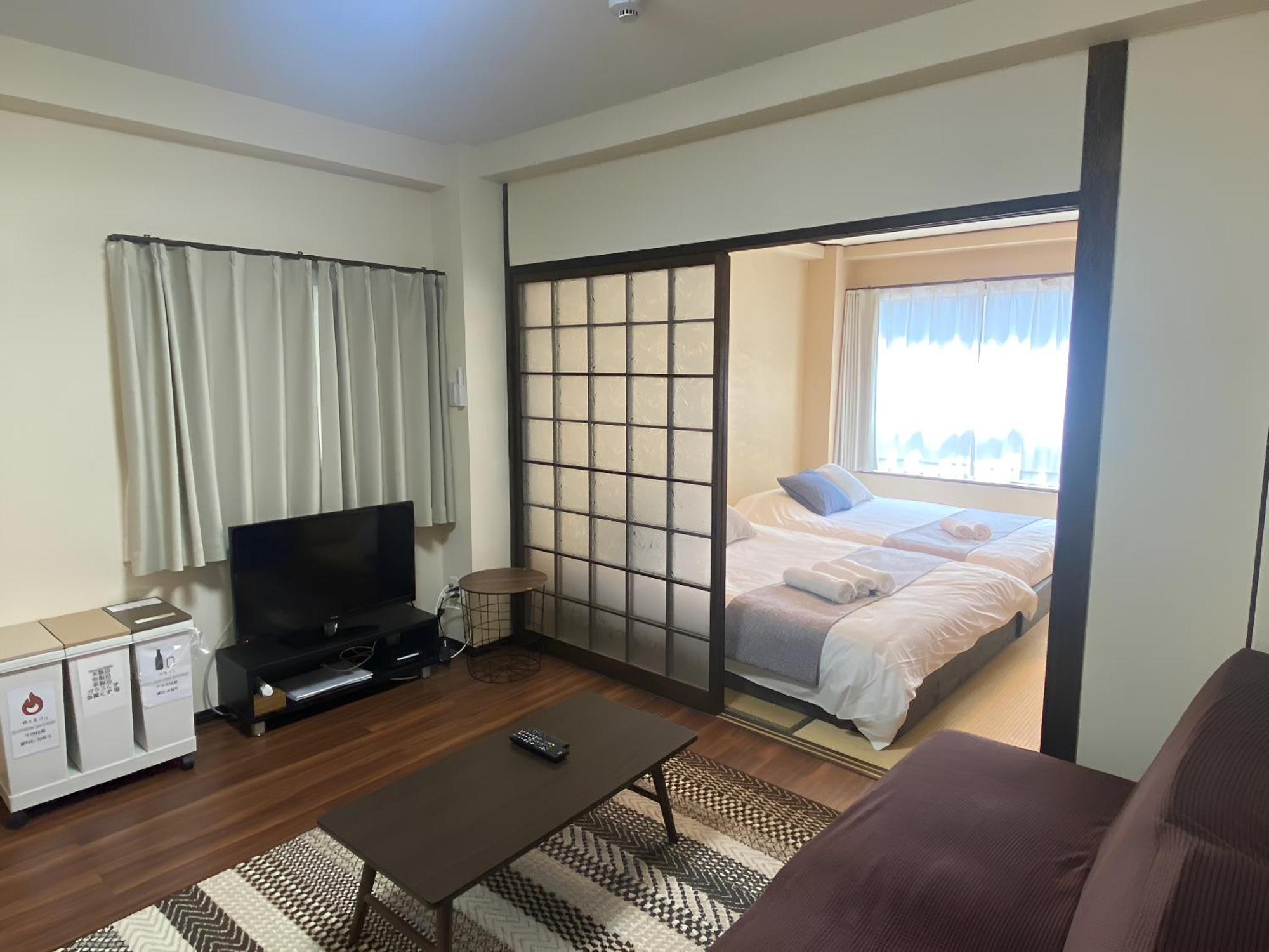 Suyi Apartment Осака Екстериор снимка