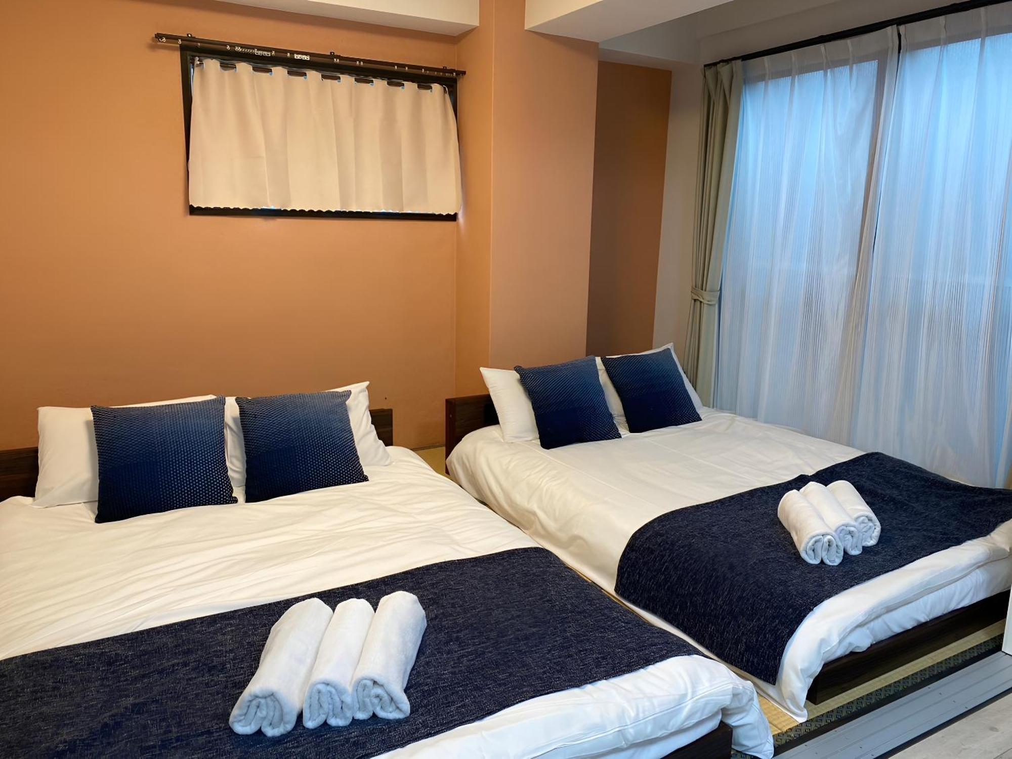 Suyi Apartment Осака Екстериор снимка