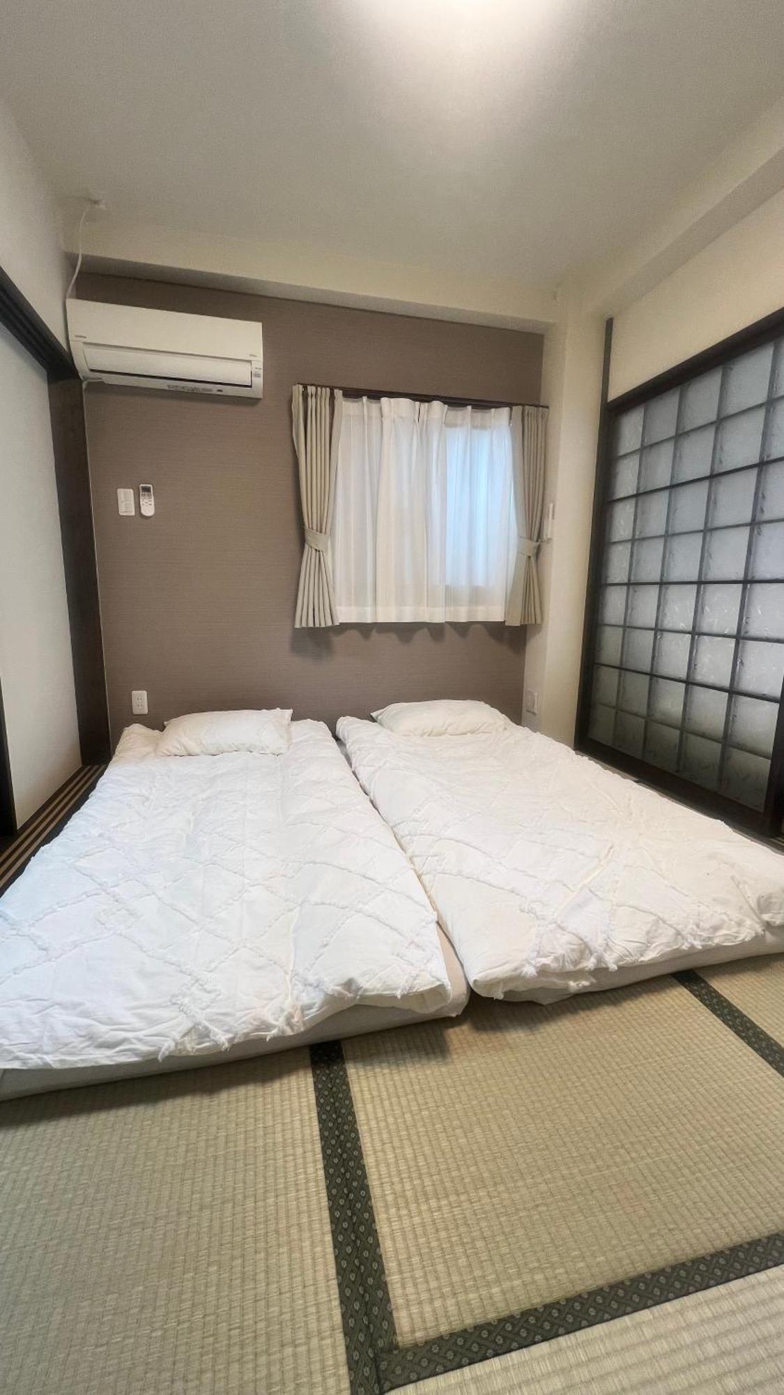 Suyi Apartment Осака Екстериор снимка