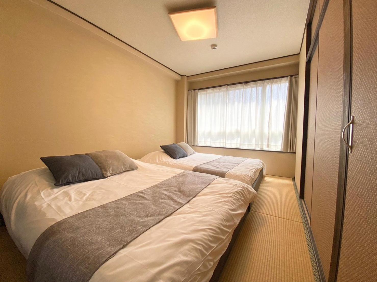 Suyi Apartment Осака Екстериор снимка